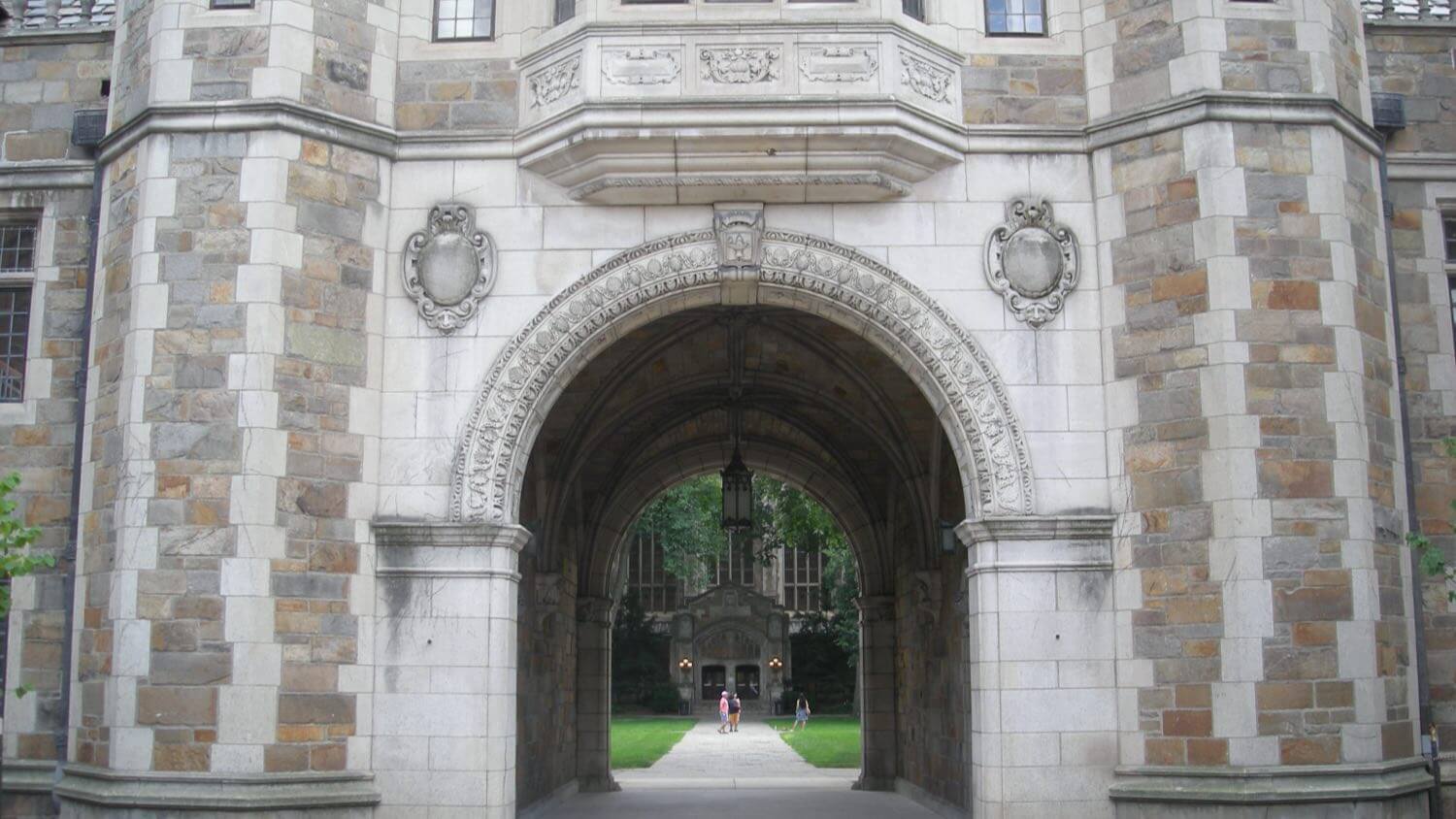 The University of Michigan Law Quadrangle's Gothic stone archway in Ann Arbor, Michigan — EMF radiation testing and shielding help for Ann Arbor homes