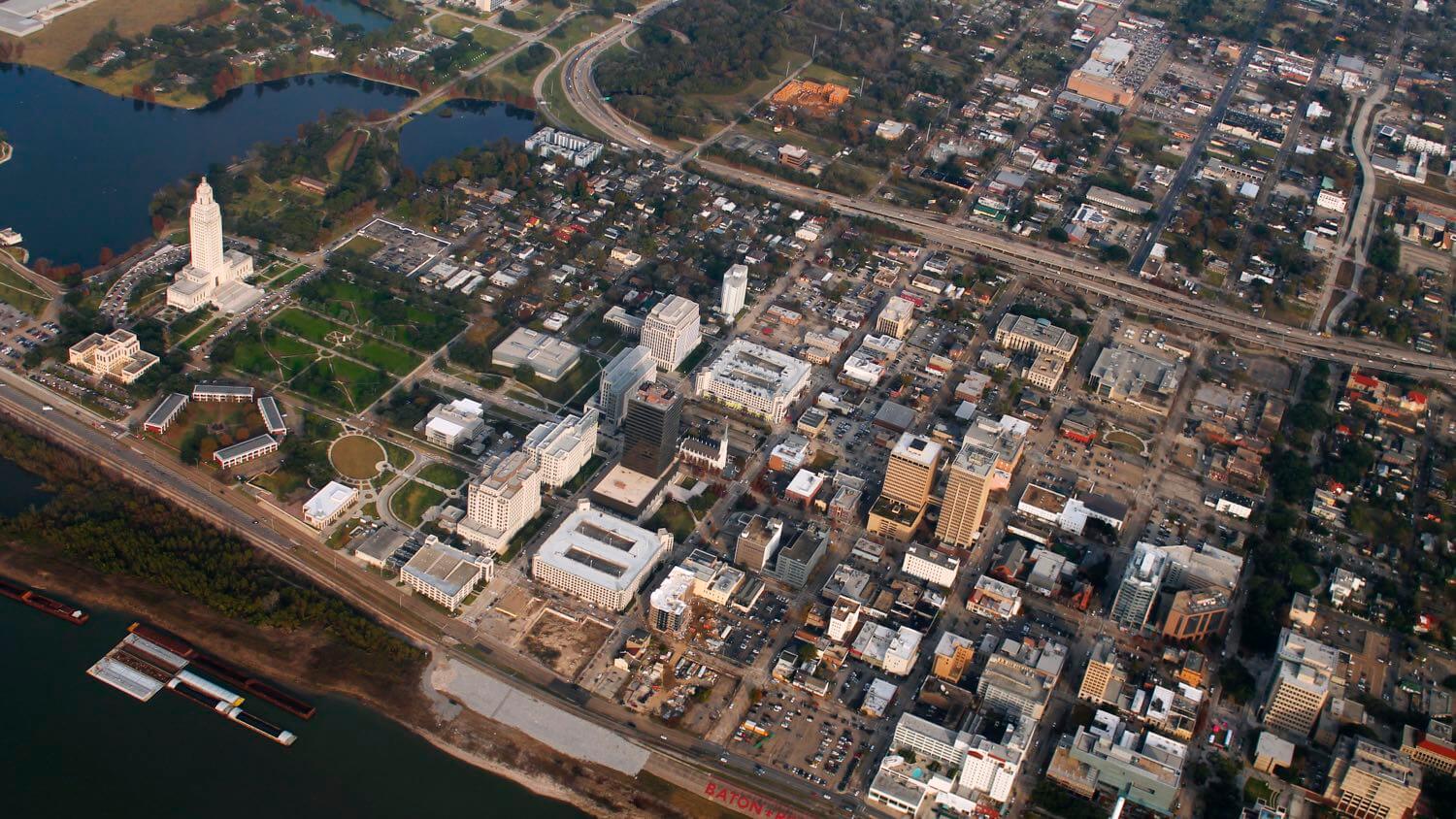 Aerial view of Baton Rouge, Louisiana with the Art Deco State Capitol and the Mississippi River &mdash; EMF radiation testing and shielding help for Baton Rouge homes