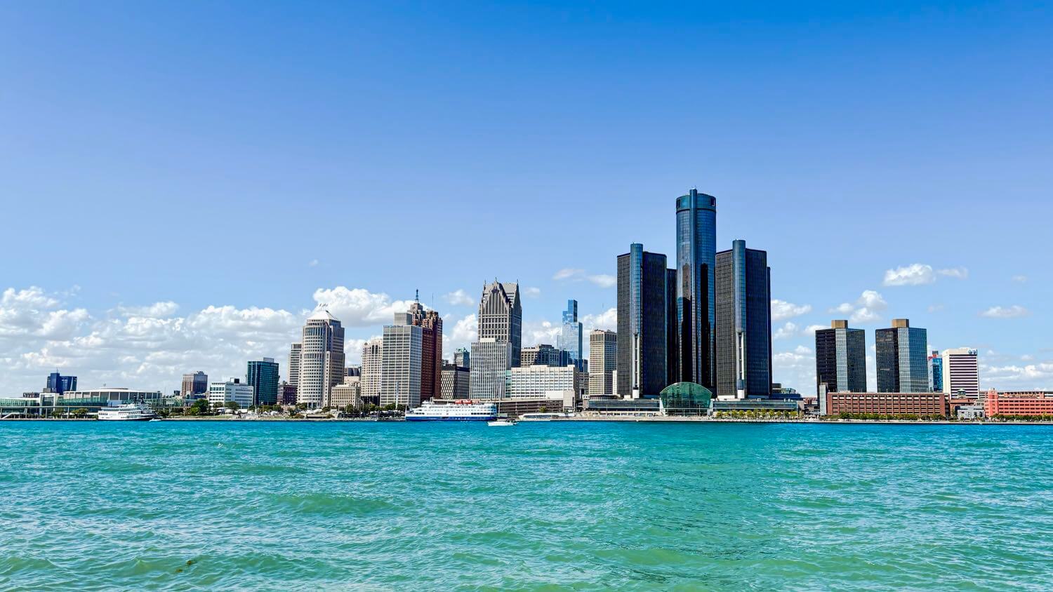 Detroit, Michigan skyline with the Renaissance Center across the Detroit River — EMF radiation testing and shielding help for Detroit homes