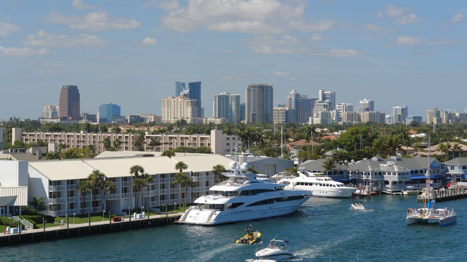 The downtown Fort Lauderdale, Florida skyline behind the Intracoastal Waterway with yachts and waterfront homes &mdash; EMF radiation testing and shielding help for Fort Lauderdale homes