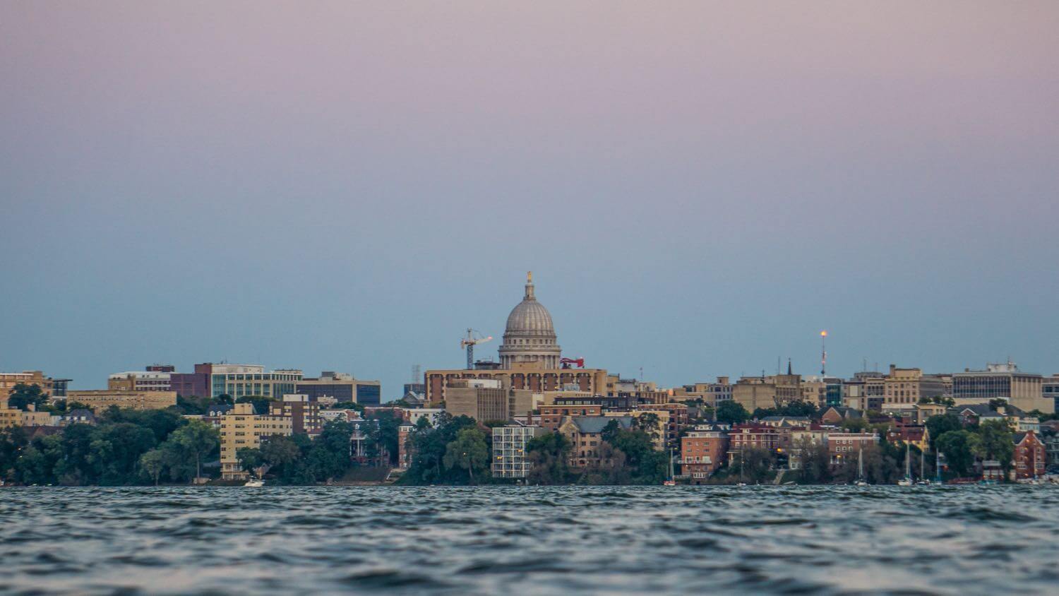 The Wisconsin State Capitol dome seen across Lake Mendota in Madison, Wisconsin &mdash; EMF radiation testing and shielding help for Madison homes