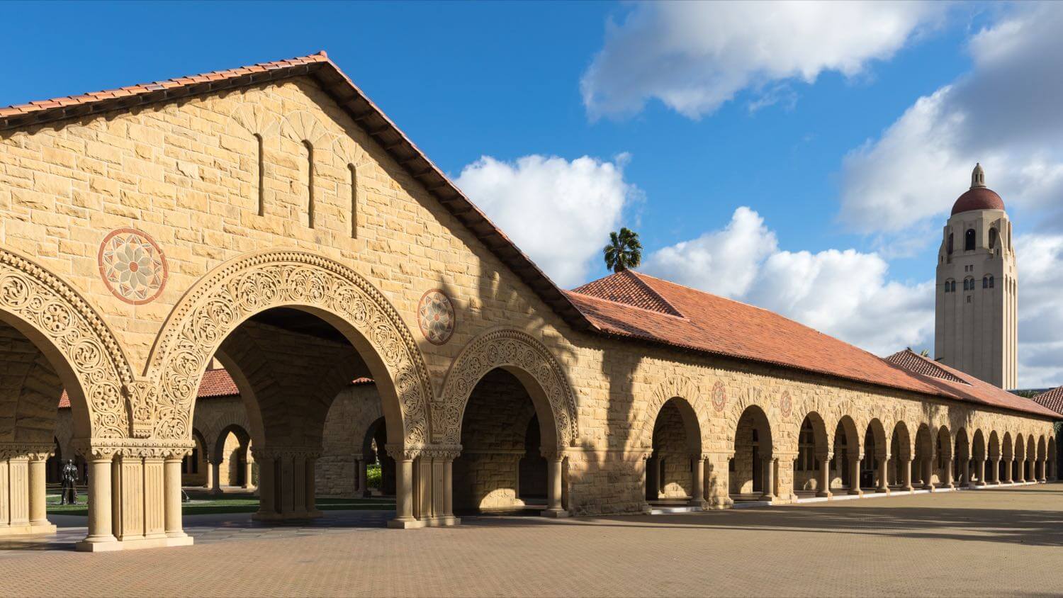 Stanford University Main Quad sandstone arches with Hoover Tower behind, in Palo Alto, California &mdash; EMF radiation testing and shielding help for Palo Alto homes