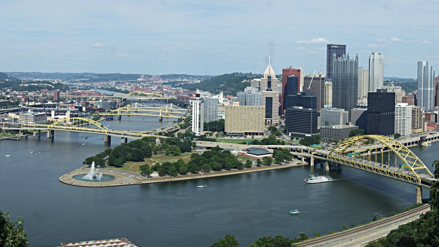 Pittsburgh, Pennsylvania’s Golden Triangle skyline seen from Mount Washington with the three rivers and bridges — EMF radiation testing and shielding help for Pittsburgh homes