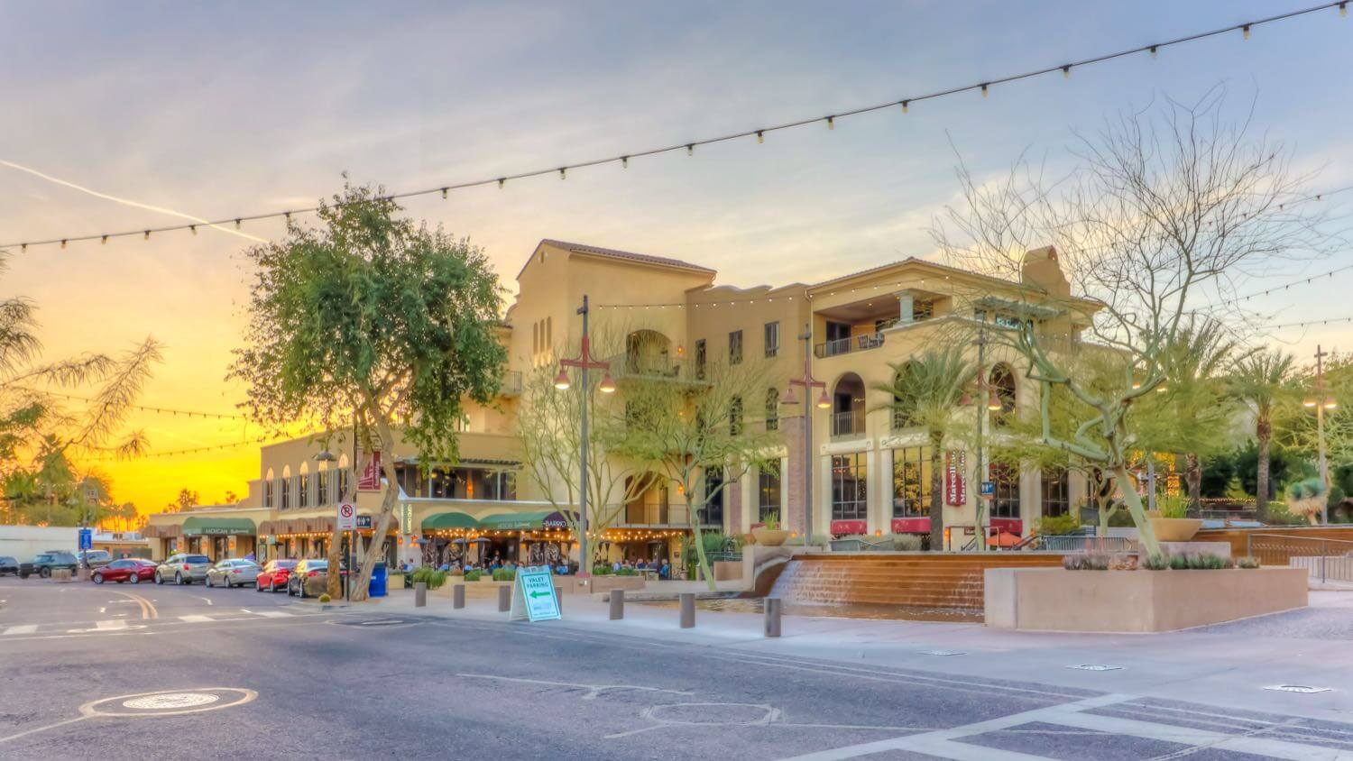 Old Town Scottsdale, Arizona streetscape at dusk with Southwestern buildings and palm trees — EMF radiation testing and shielding help for Scottsdale homes