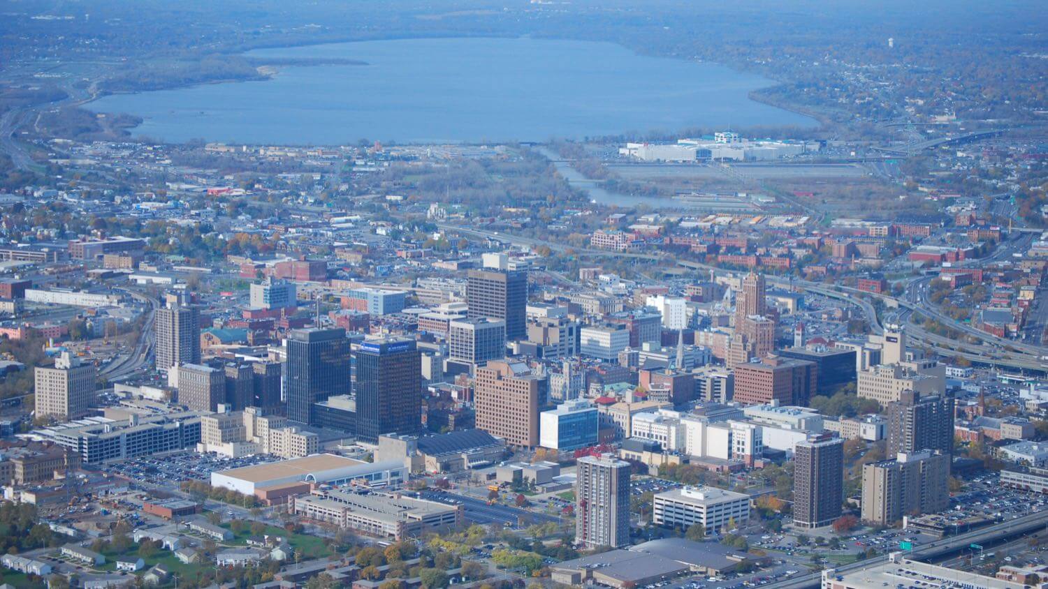 Downtown Syracuse, New York from the air with Onondaga Lake in the distance &mdash; EMF radiation testing and shielding help for Syracuse homes